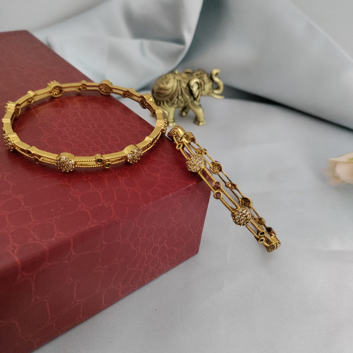 White stone studded simple bangle