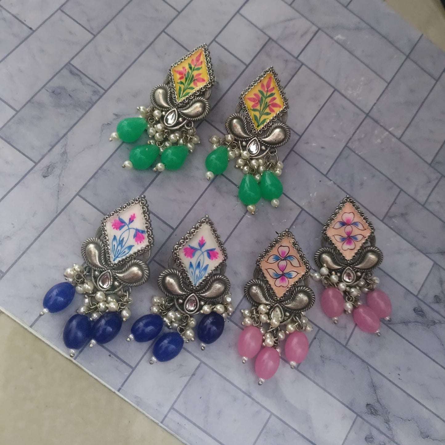 Hand painted diamond shaped dangler