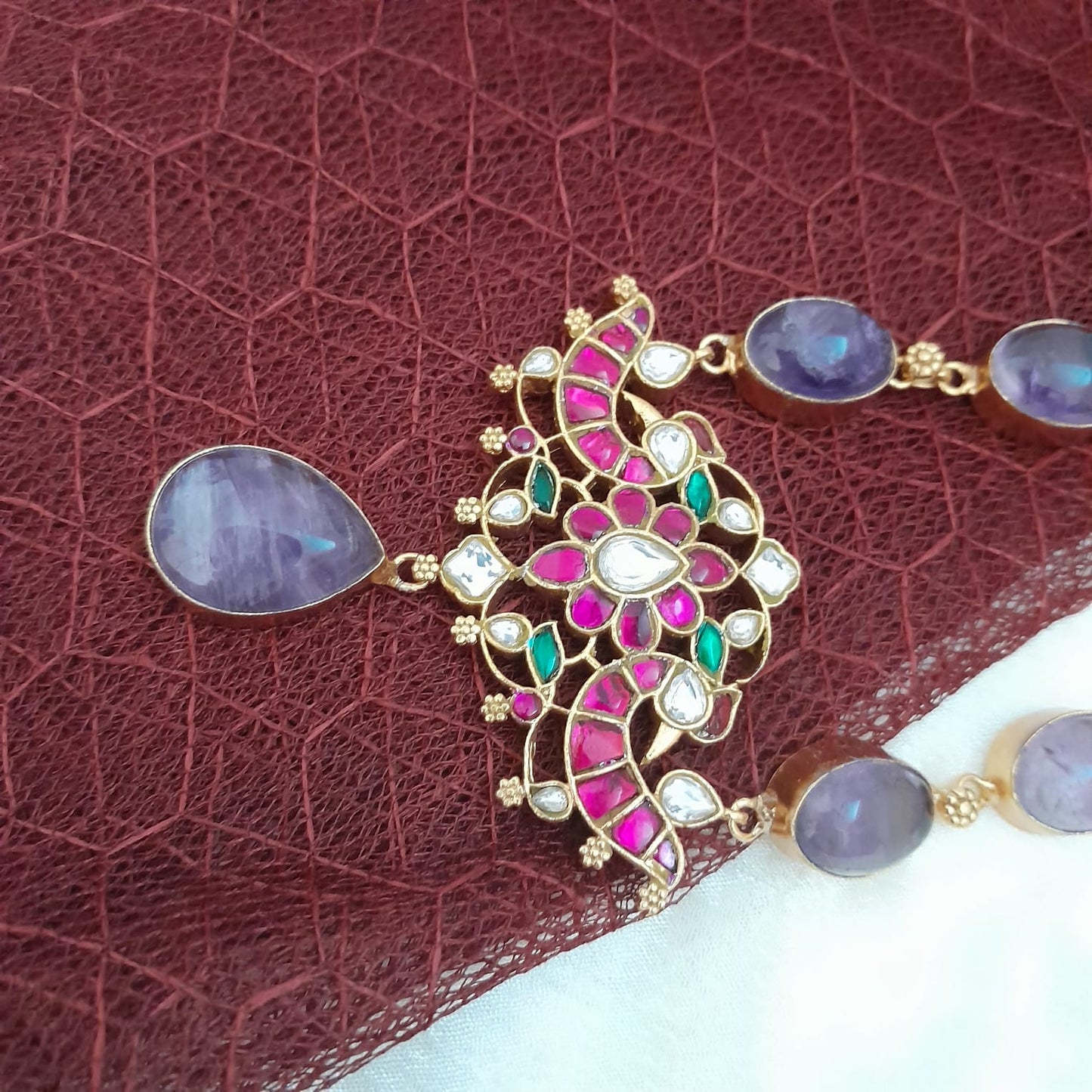 Bold and beautiful Jadau kundan exclusive stone necklace set