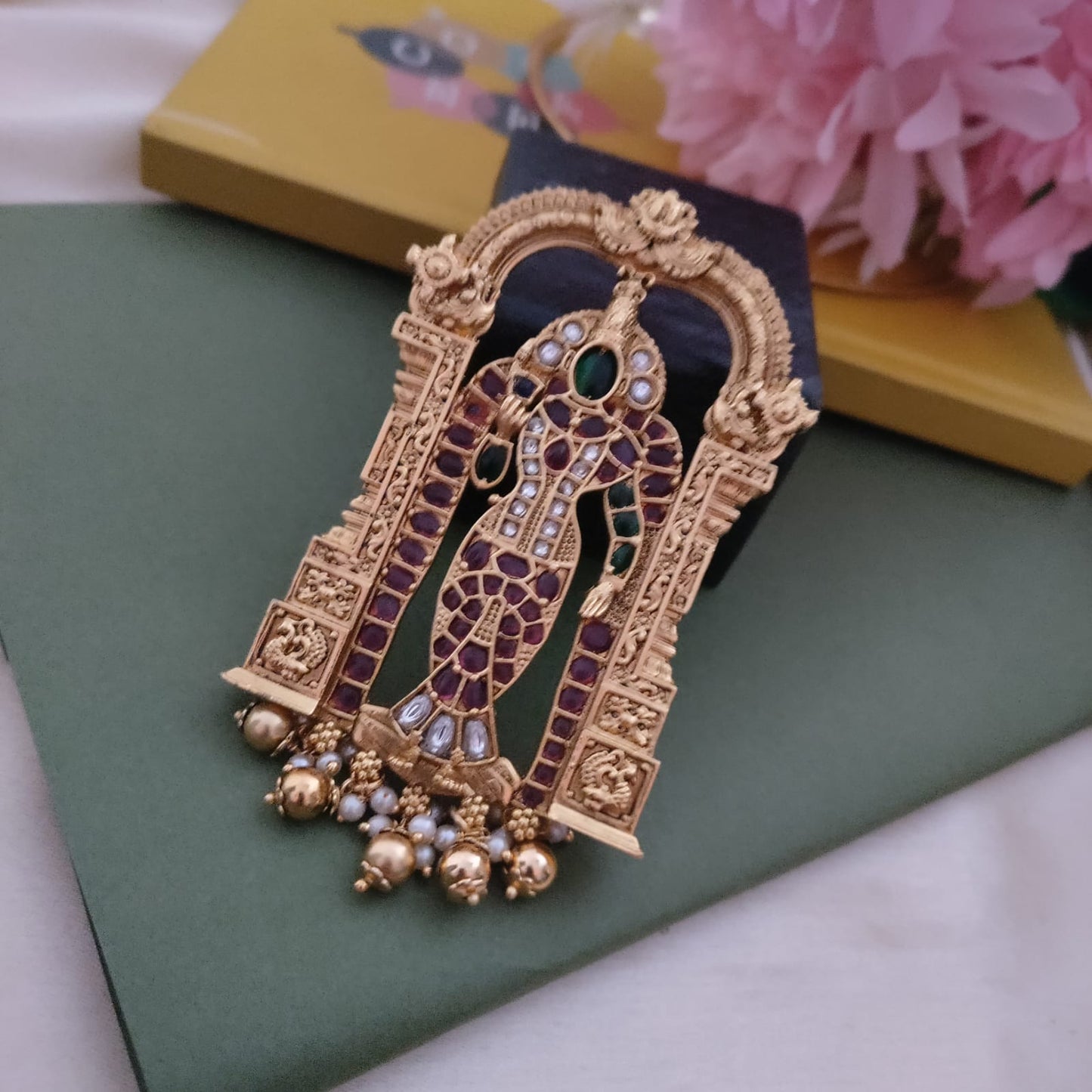 Divine, elegance, Deity pendant with hasuli