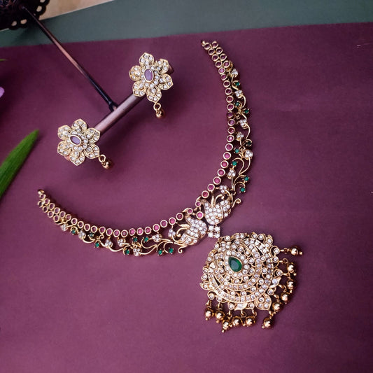 Golden ruby&white stone necklace
