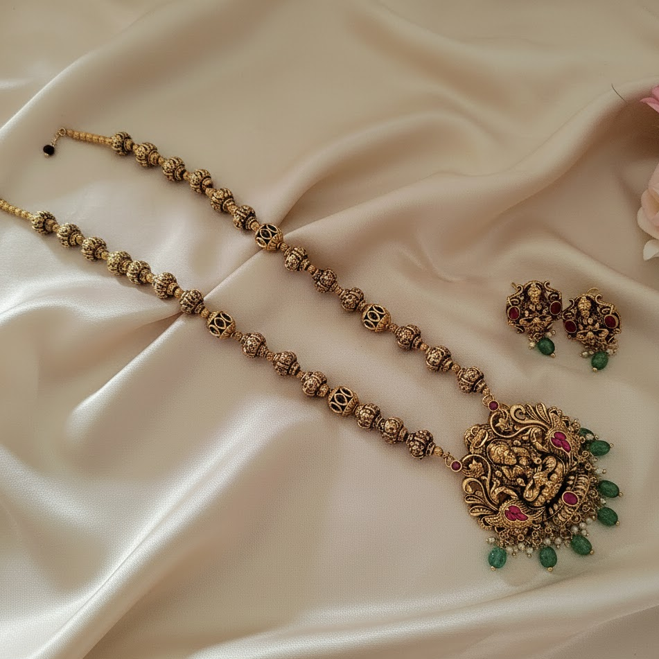 Golden ball nakshi work lakshmi pendant long chain set