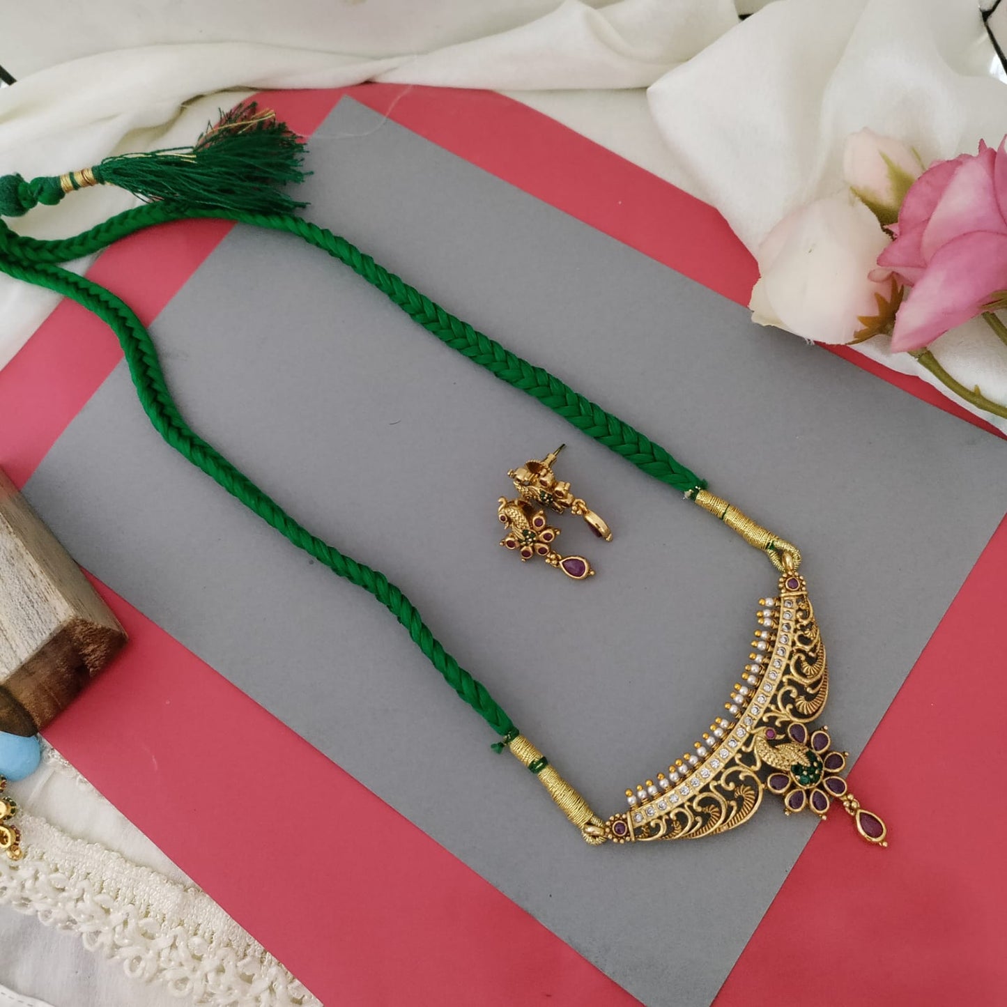 Kemp peacock ruby gold pendant green rope