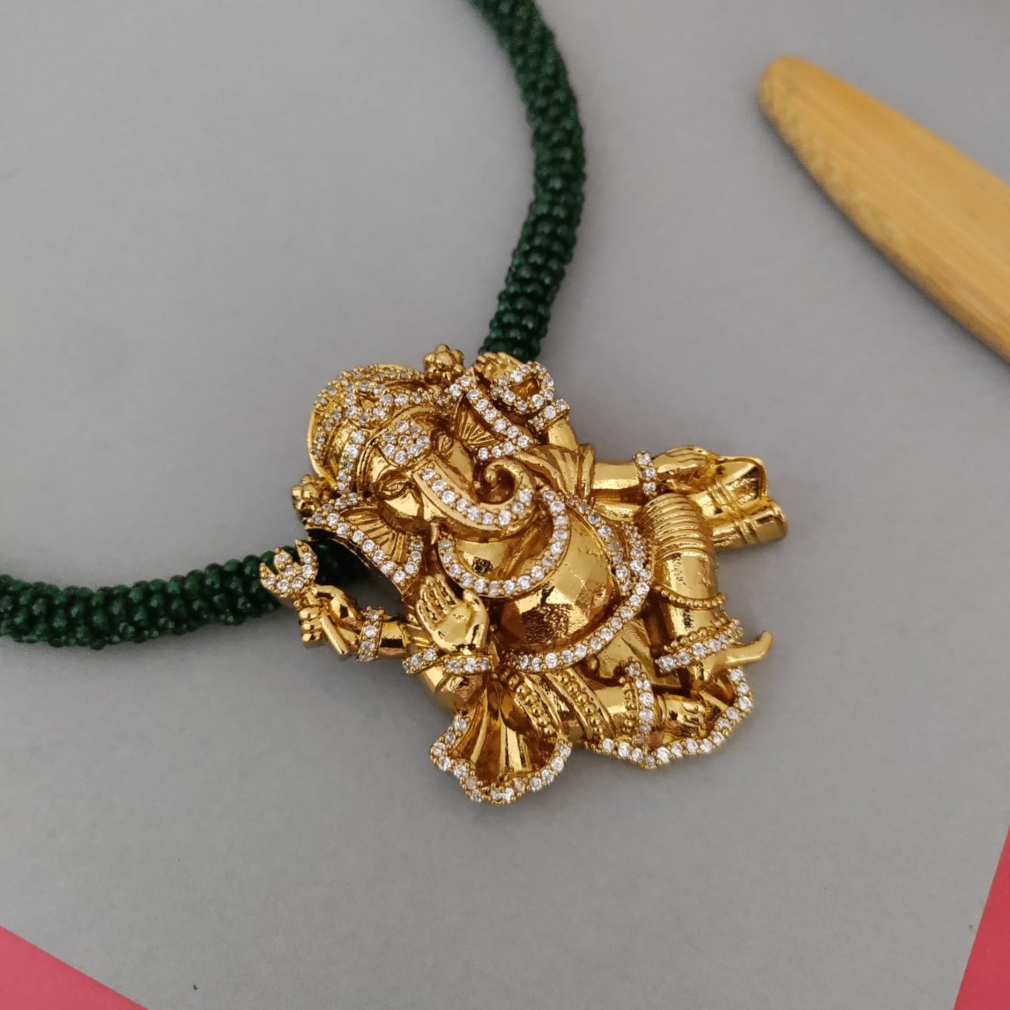 Ganesha AD stone pendant beaded chain