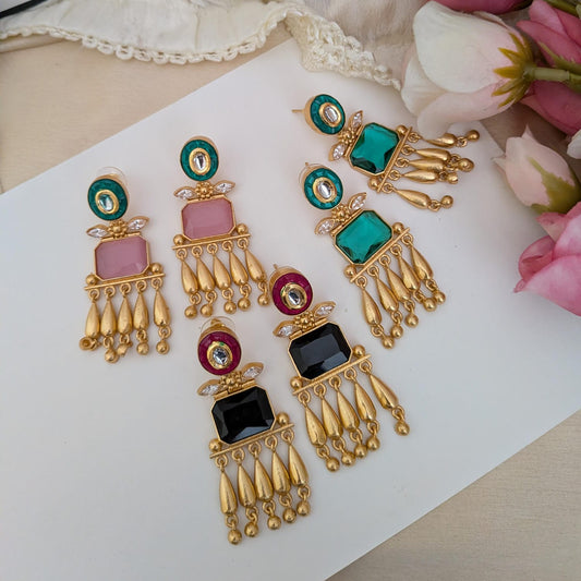 Golden stone studded dangler earring