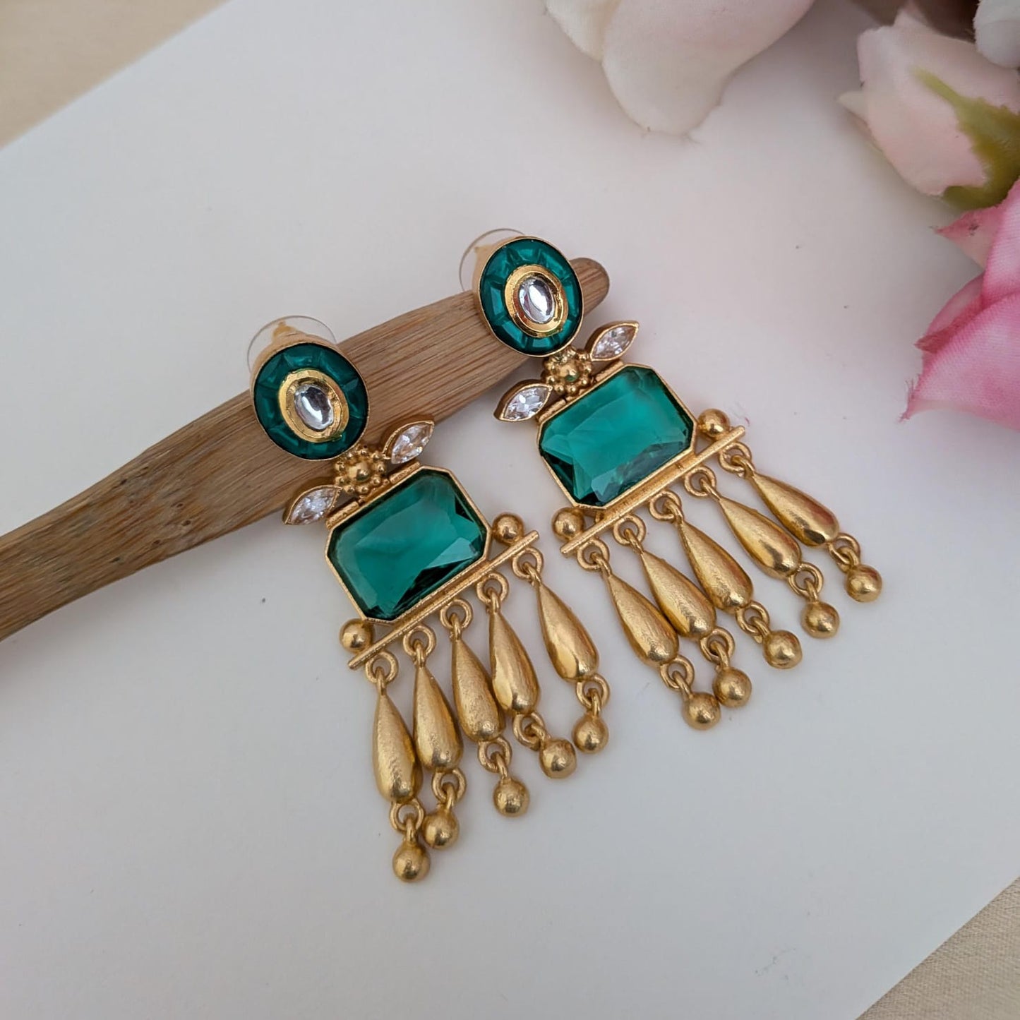 Golden stone studded dangler earring