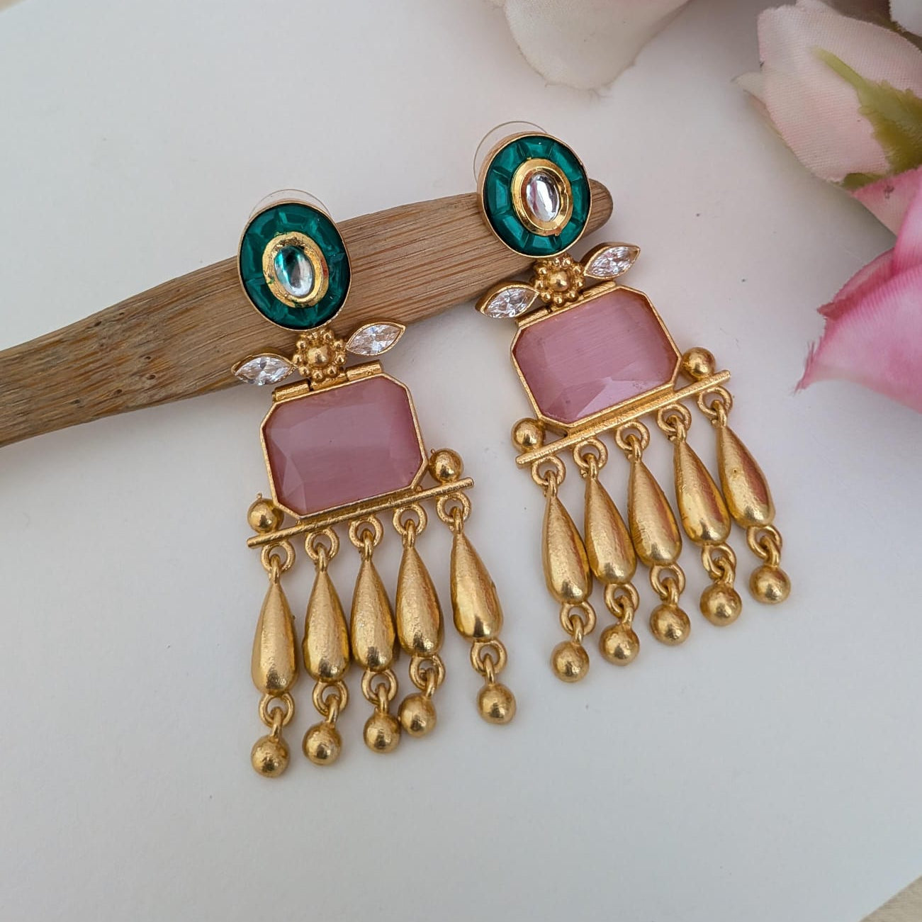 Golden stone studded dangler earring