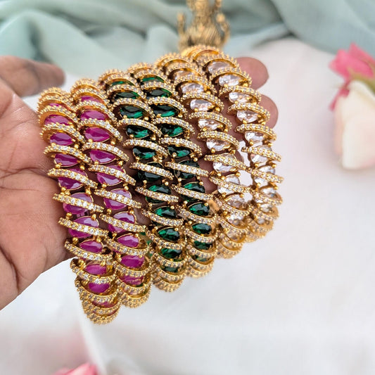 AD stone studded Spiral Bangle