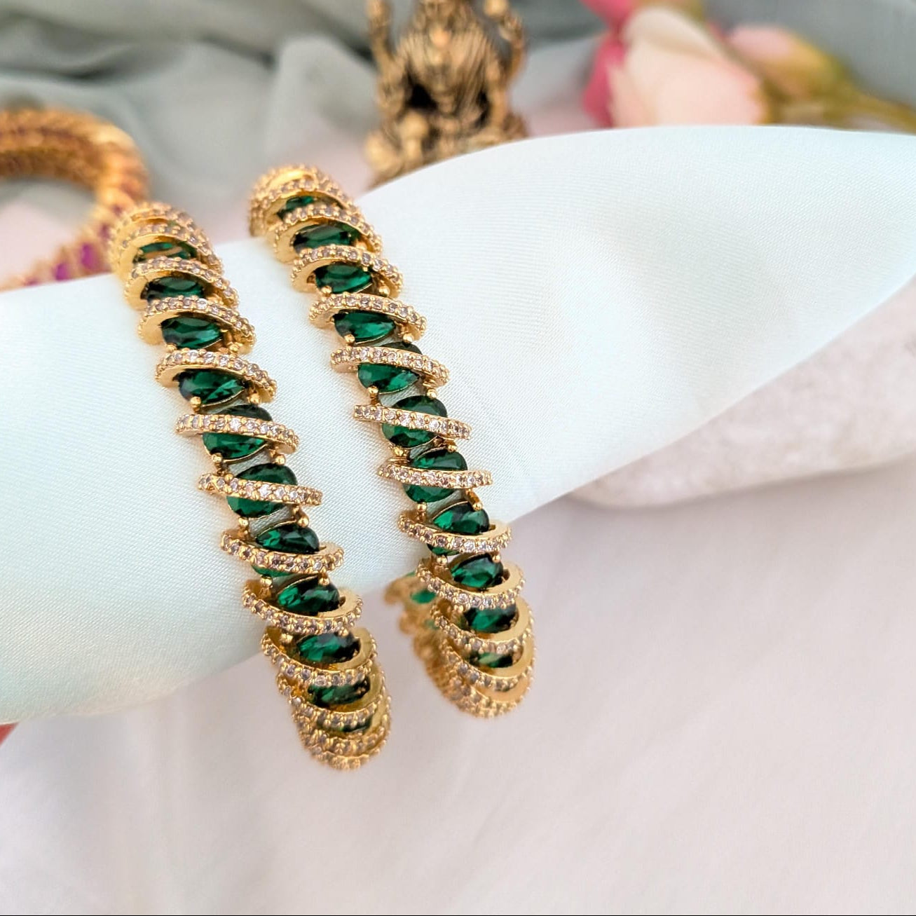 AD stone studded Spiral Bangle