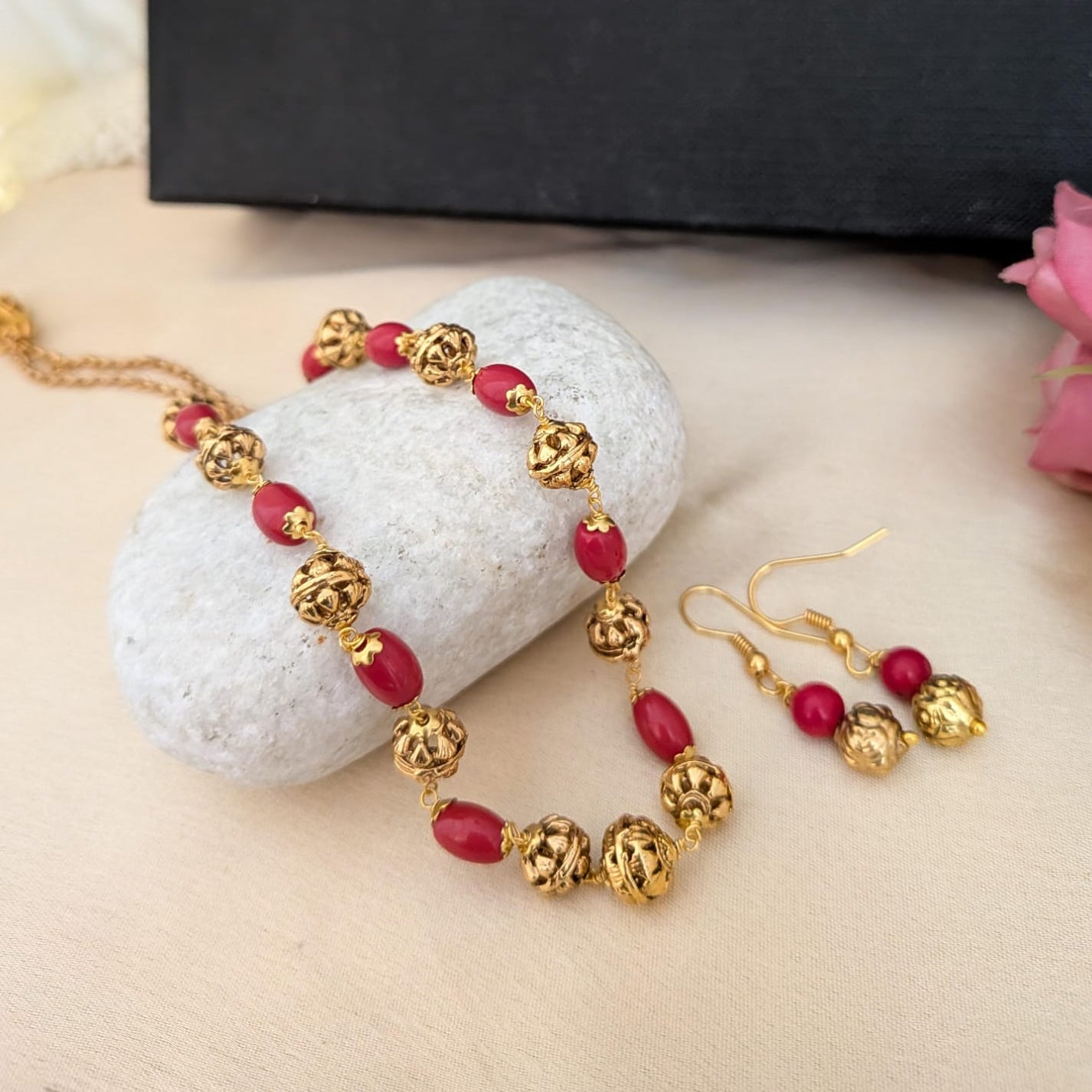 Coral red with gold beaded necklace