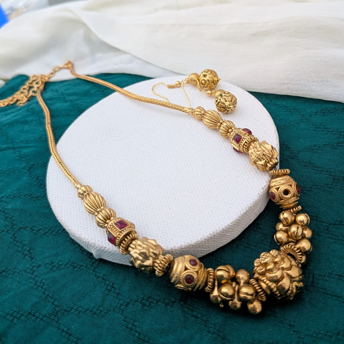 Golden ball with ghongroo beaded necklace