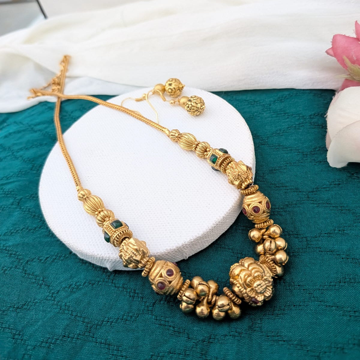 Golden ball with ghongroo beaded necklace