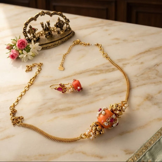Coral beaded pearl necklace