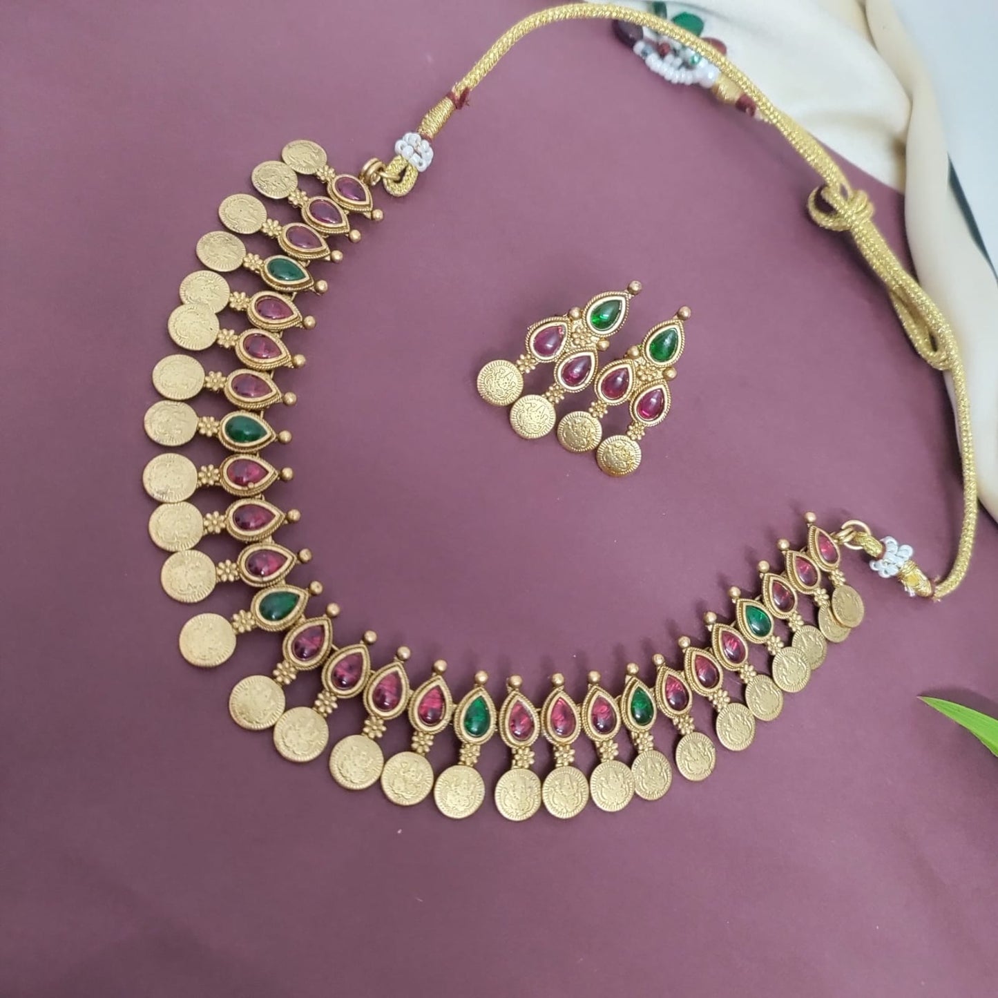 Ruby with green stone studded coin necklace