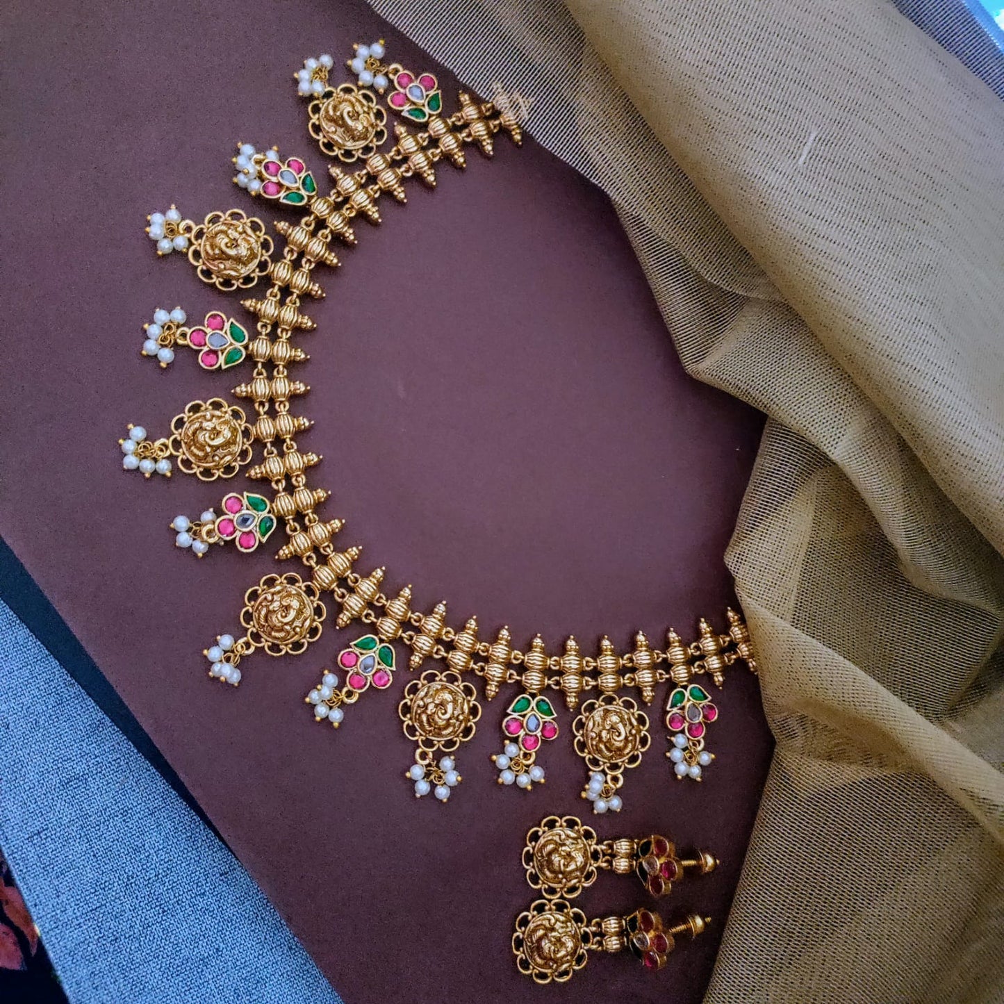 Jadau kundan floral with ganesha motif necklace set