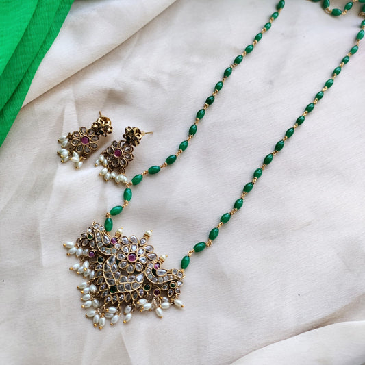 Sleek green chain with white stone pendant Long Necklace