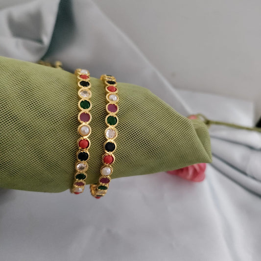 Navratna stone studded micropolished bangle