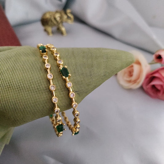 Sleek white with green stone bangle
