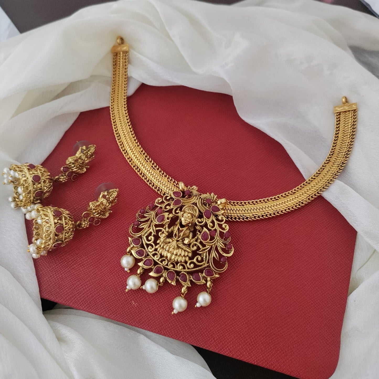 Ruby stone lakshmi pendant hasli set