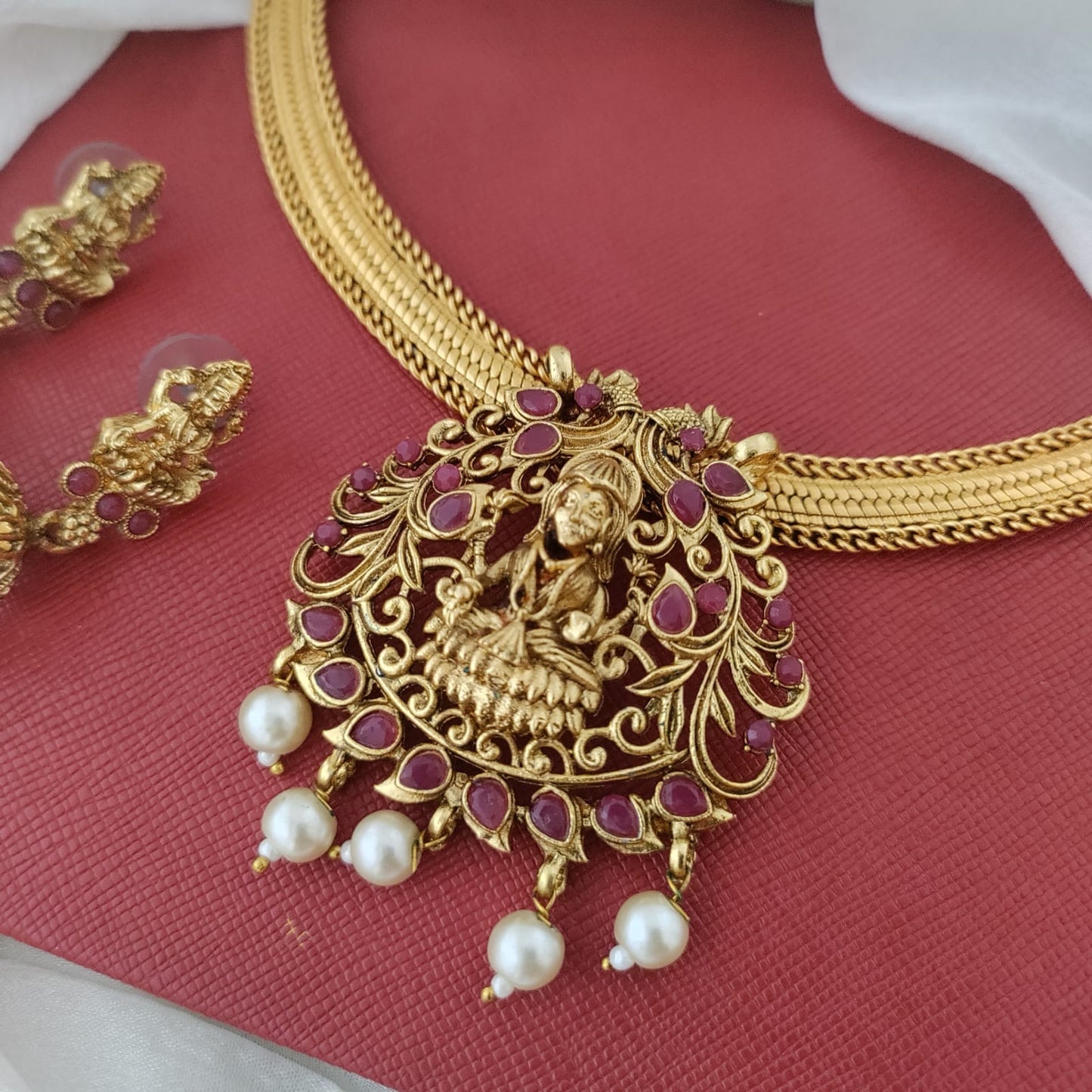 Ruby stone lakshmi pendant hasli set