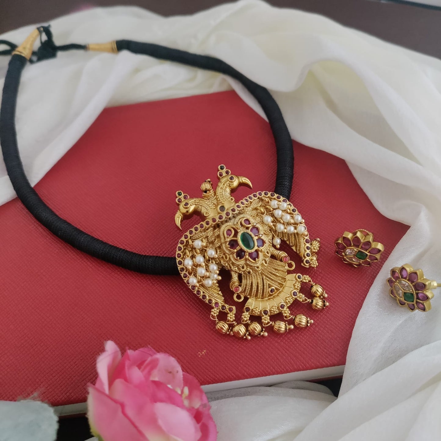 Gandaperunda pendant with black thread