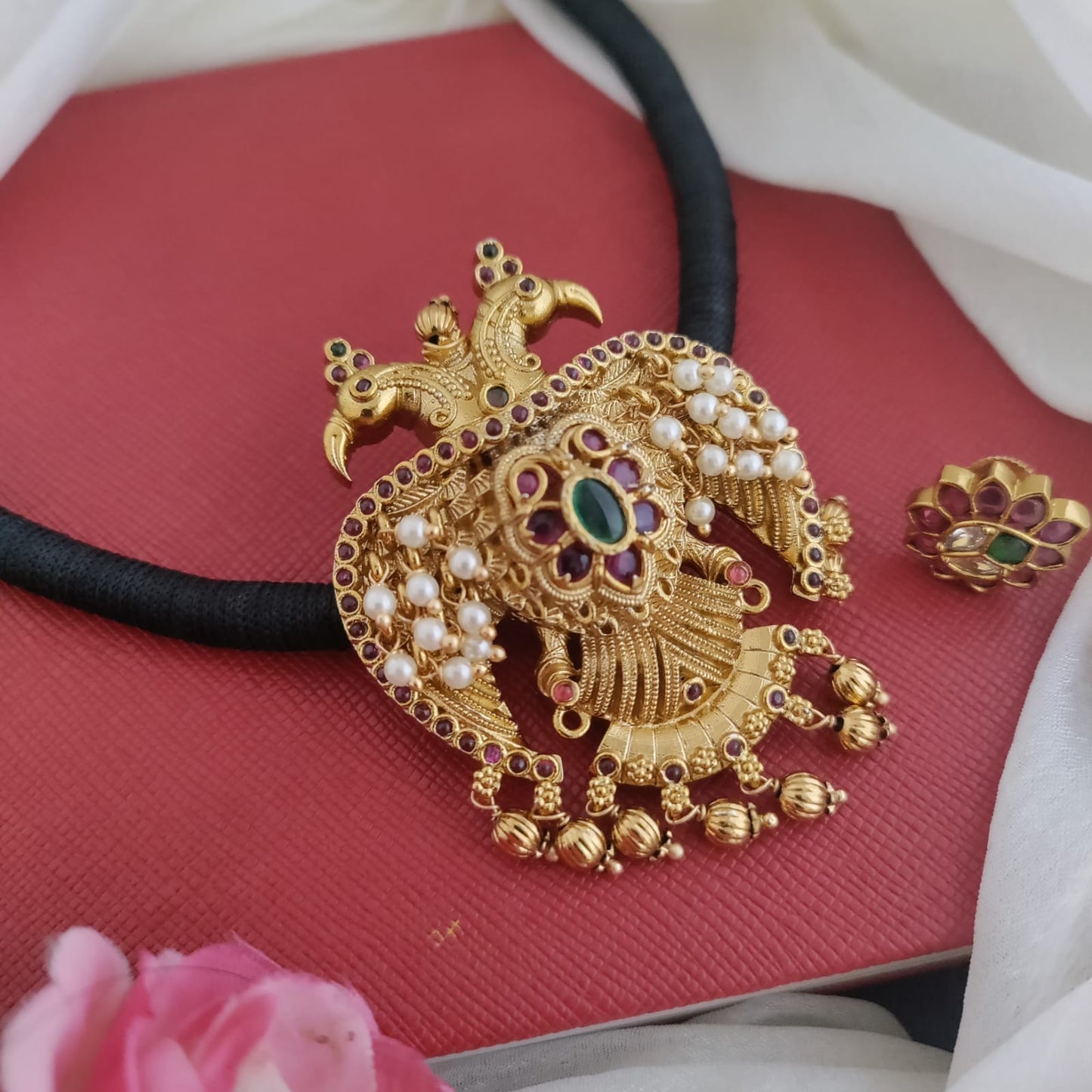 Gandaperunda pendant with black thread