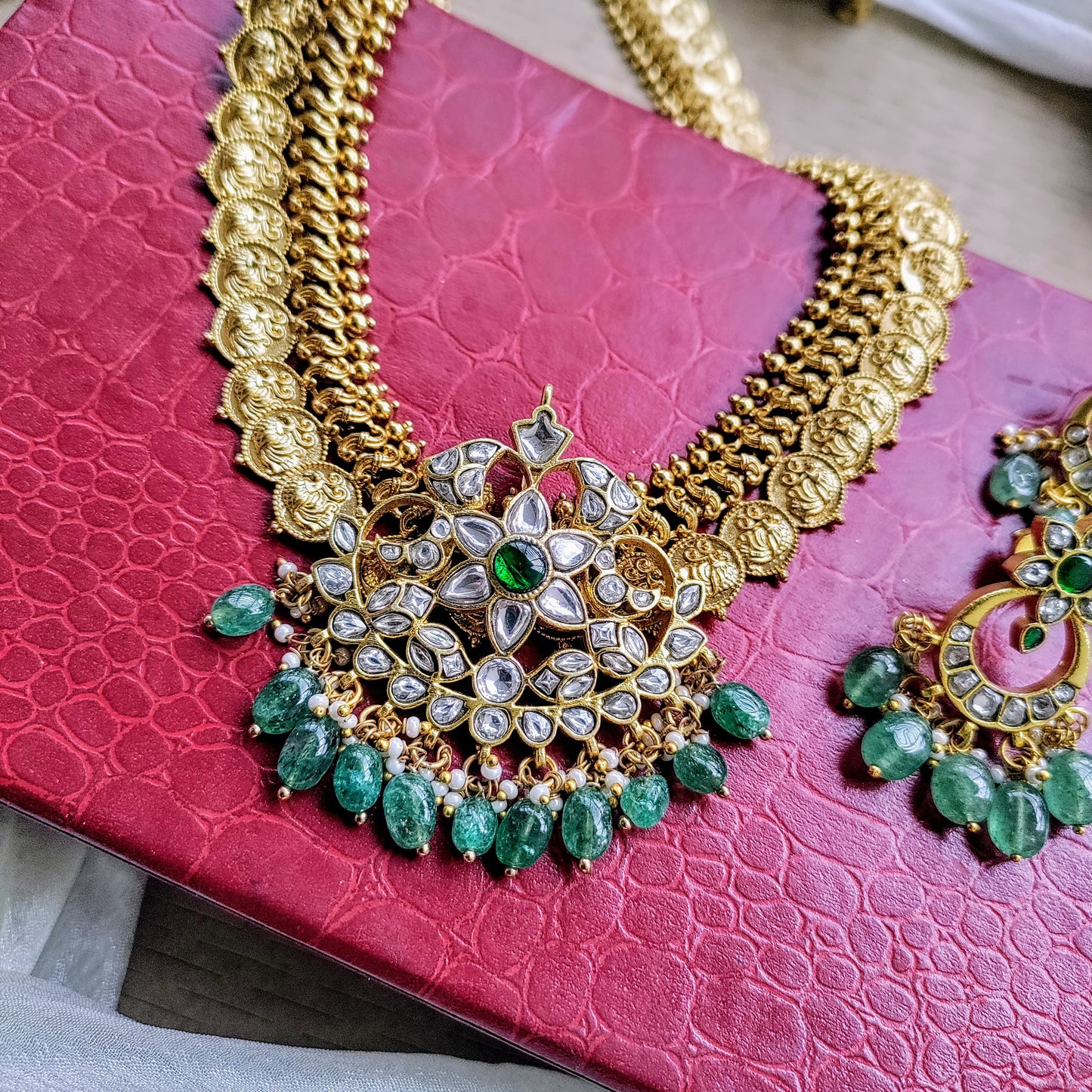 Jadau kundan peacock design necklace set with ornate shaped pendant