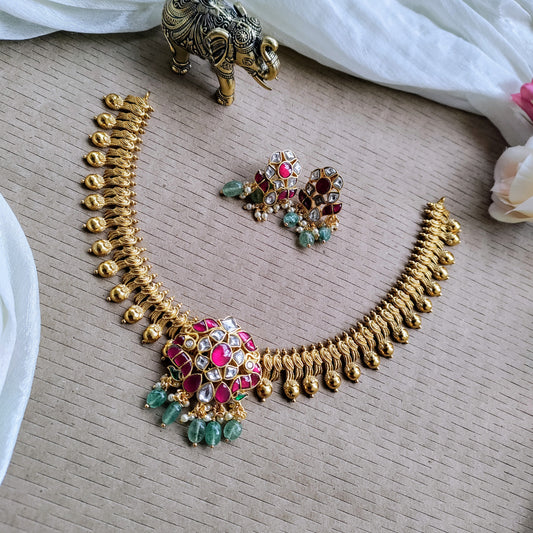Exquisite Jadau kundan necklace set with floral pendant