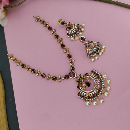 Leaf peacock ad necklace