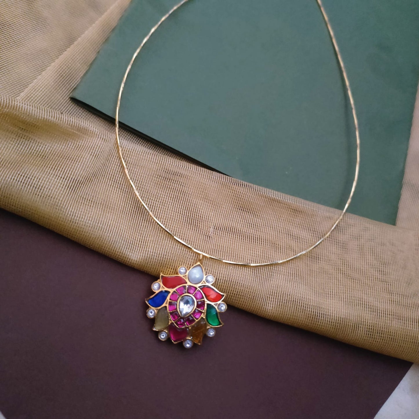 Jadau navratna stone pendant with hasli