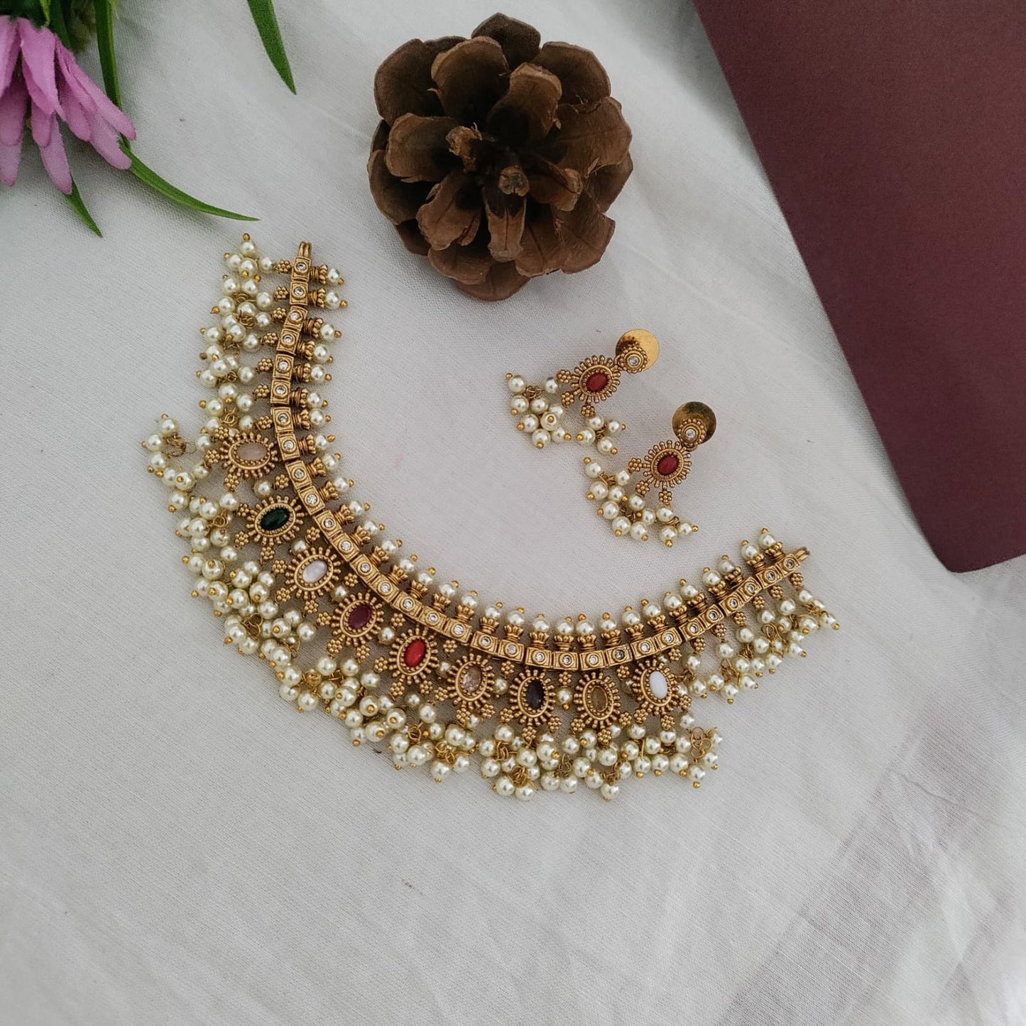 Short Guttapusulu navratna stone studded necklace