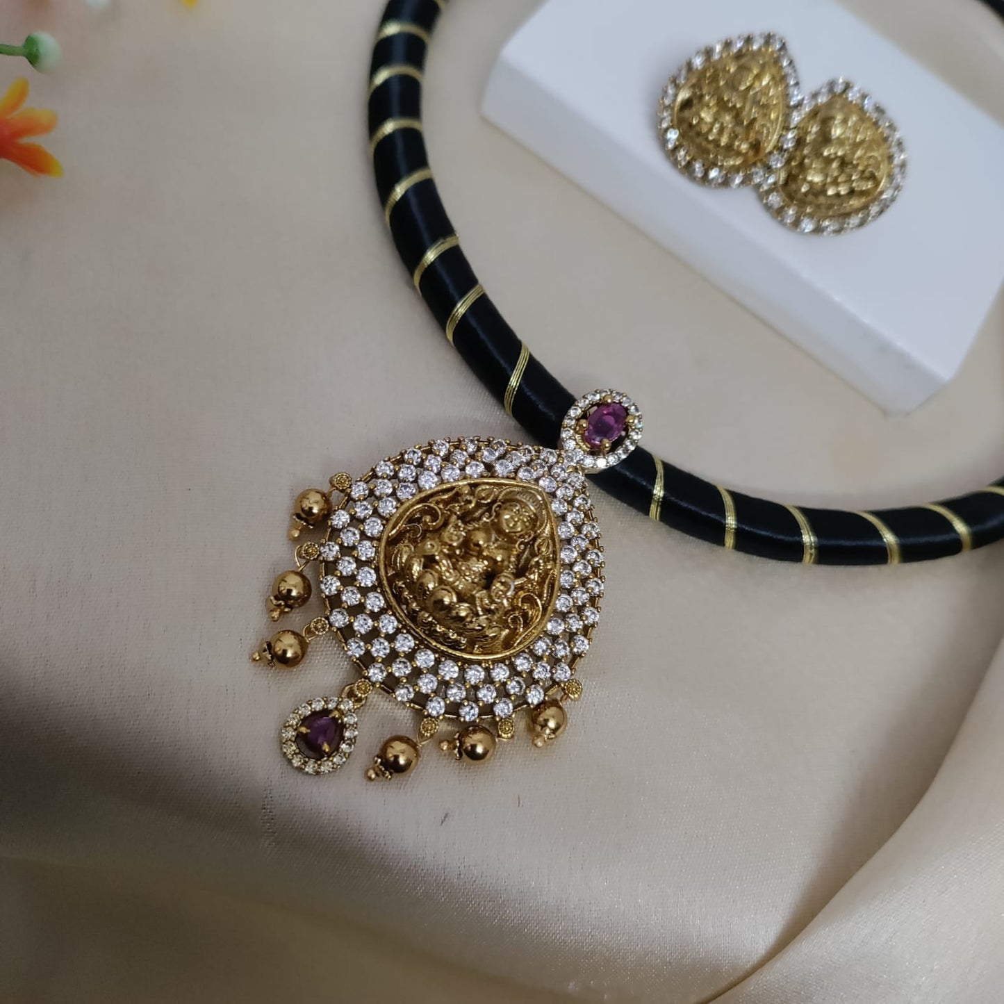 Lakshmi white stone black thread necklace