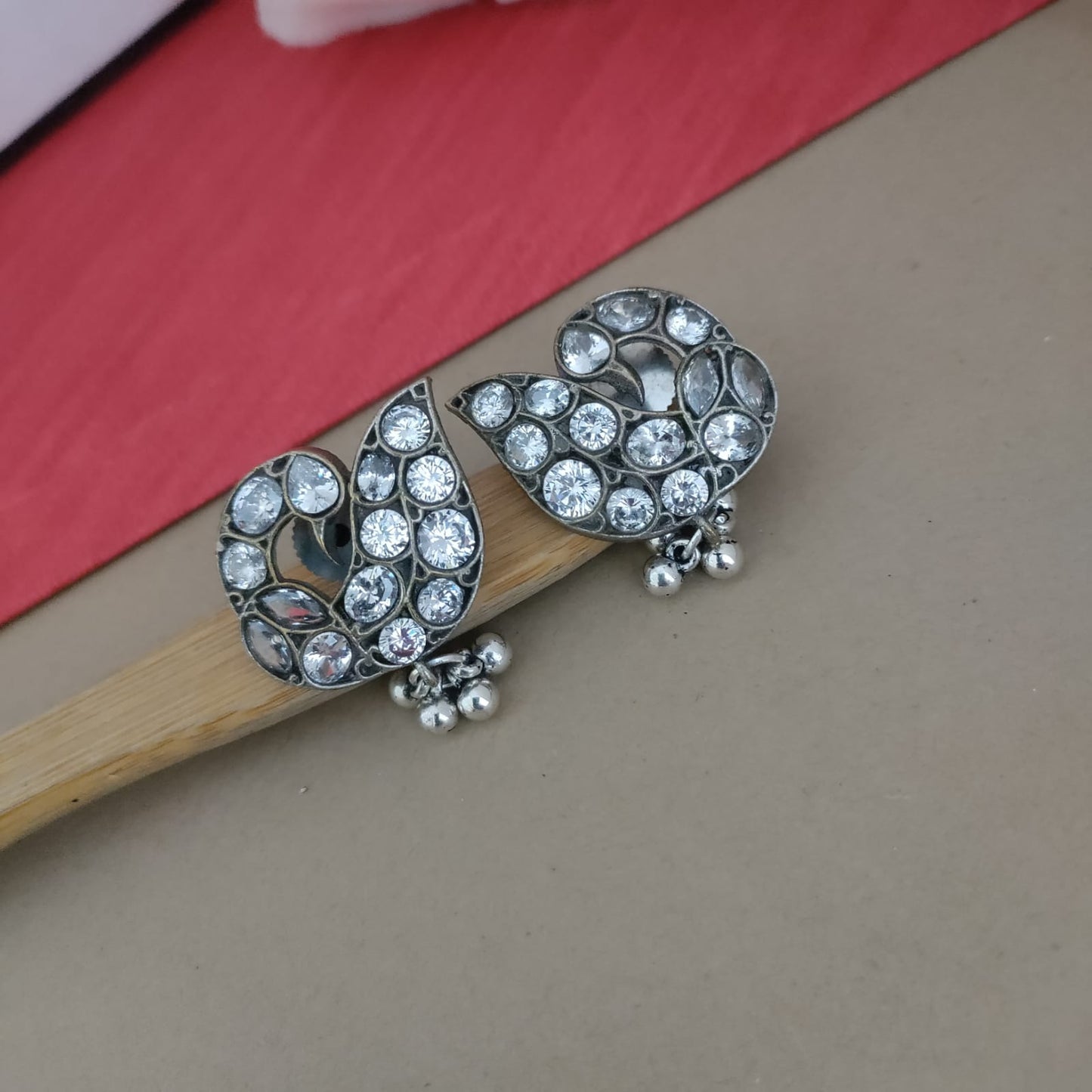 Peacock white stone earring