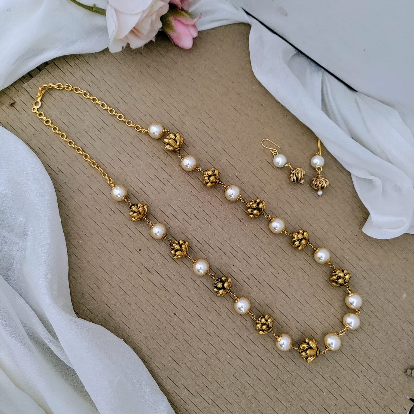 Lotus with pearl antique mala