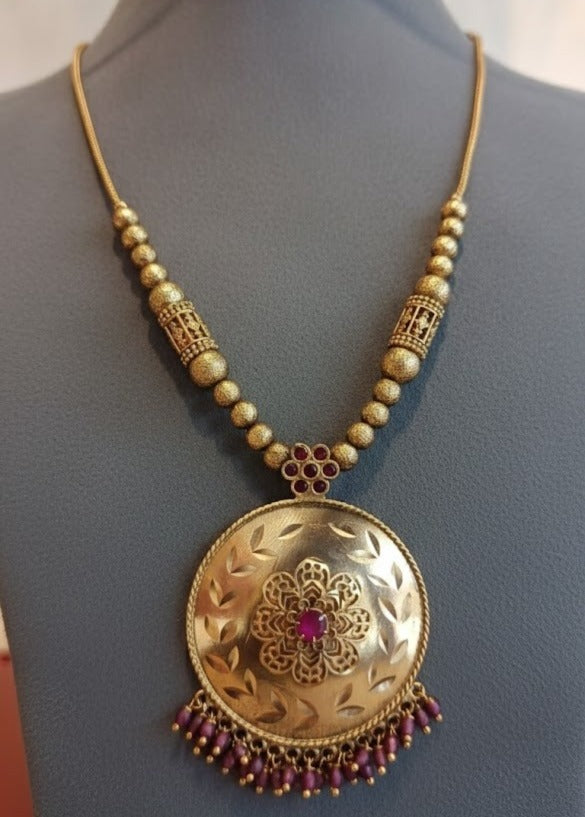 Round ruby drop necklace