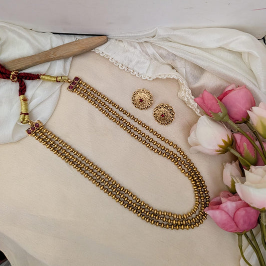 Golden three layer Ashtapailu necklace