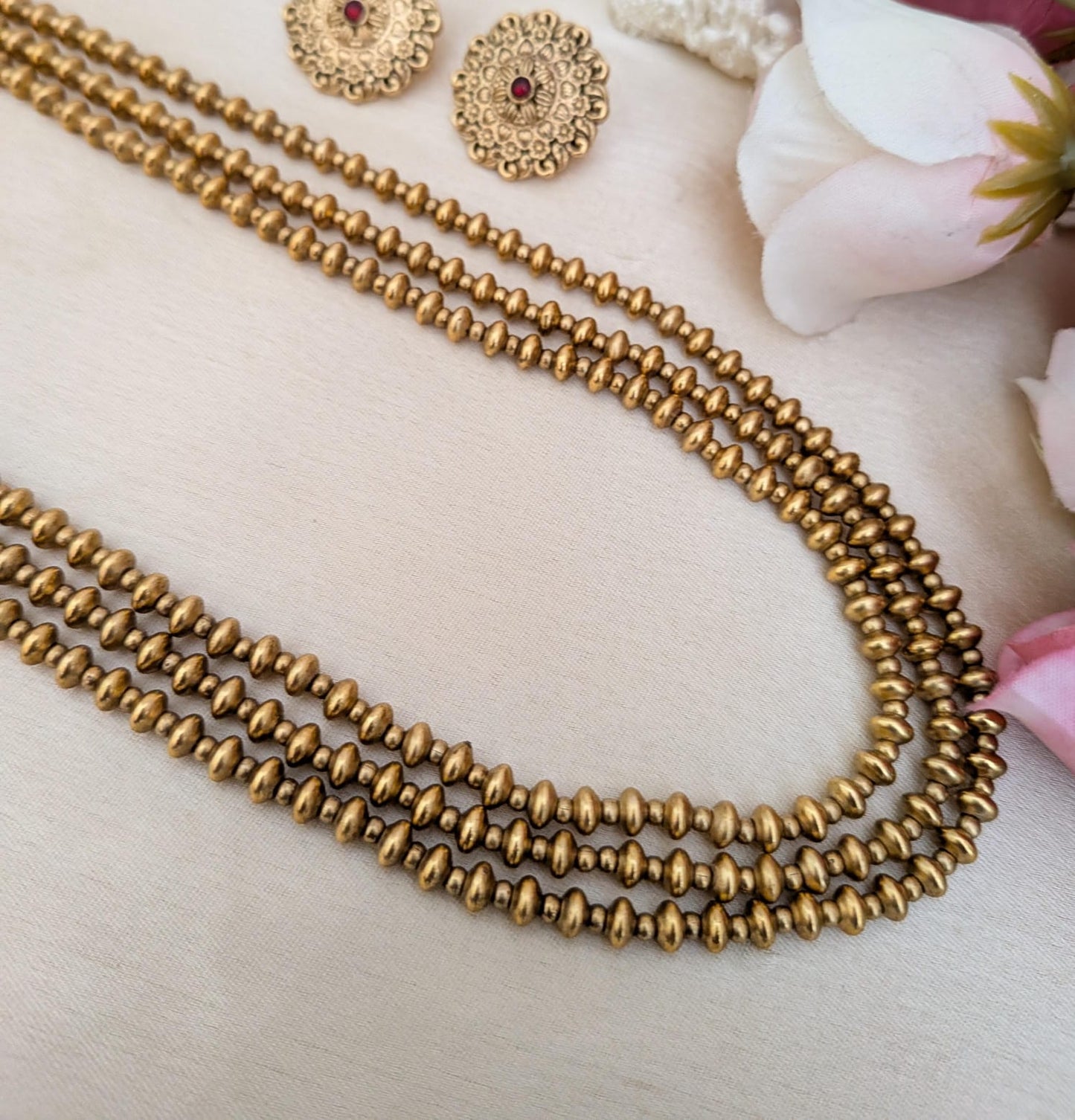 Golden three layer Ashtapailu necklace