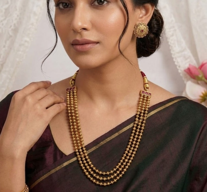 Golden three layer Ashtapailu necklace
