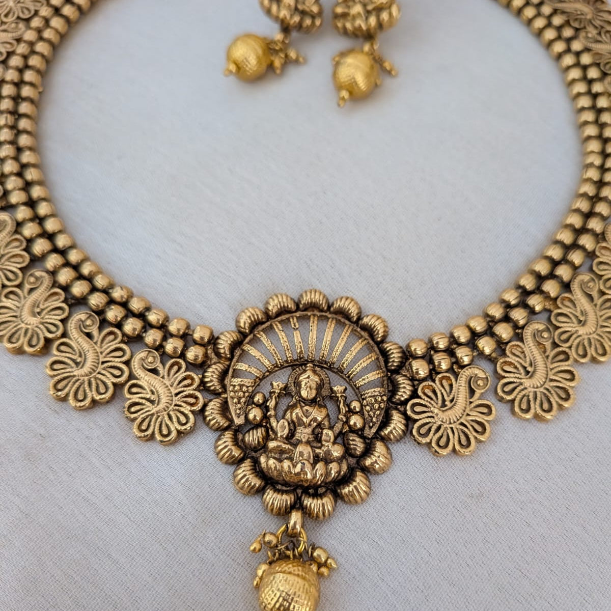 Lakshmi with  Peacock Necklace