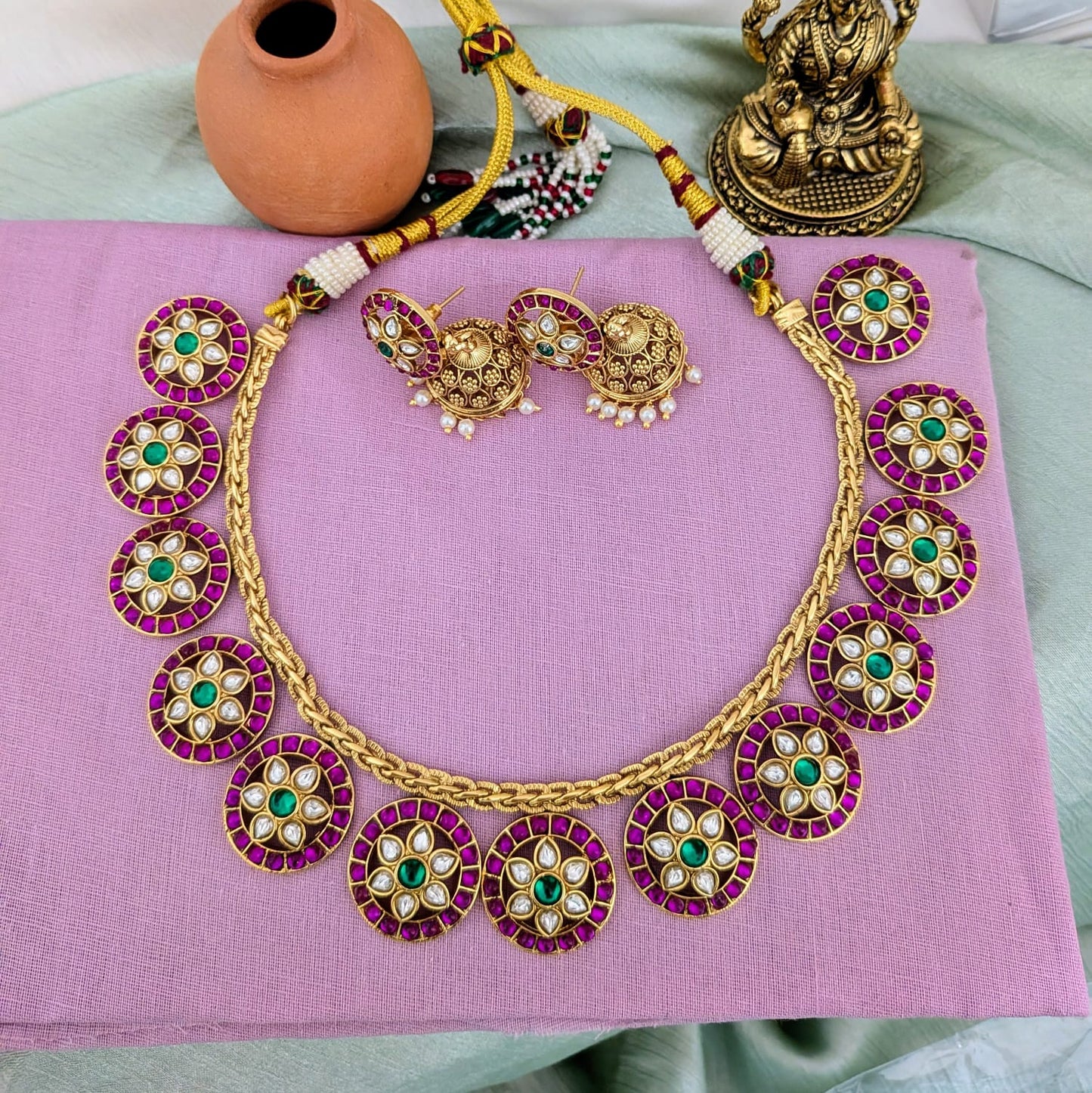 Round motin kemp ruby stone necklace