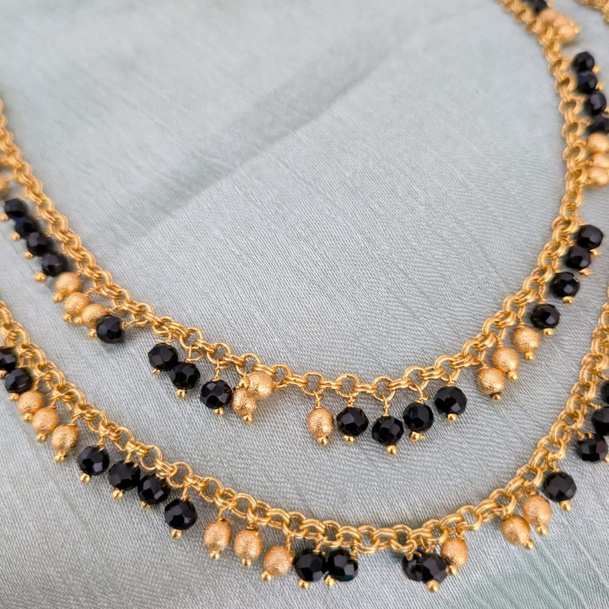 Gold with black beaded anklet