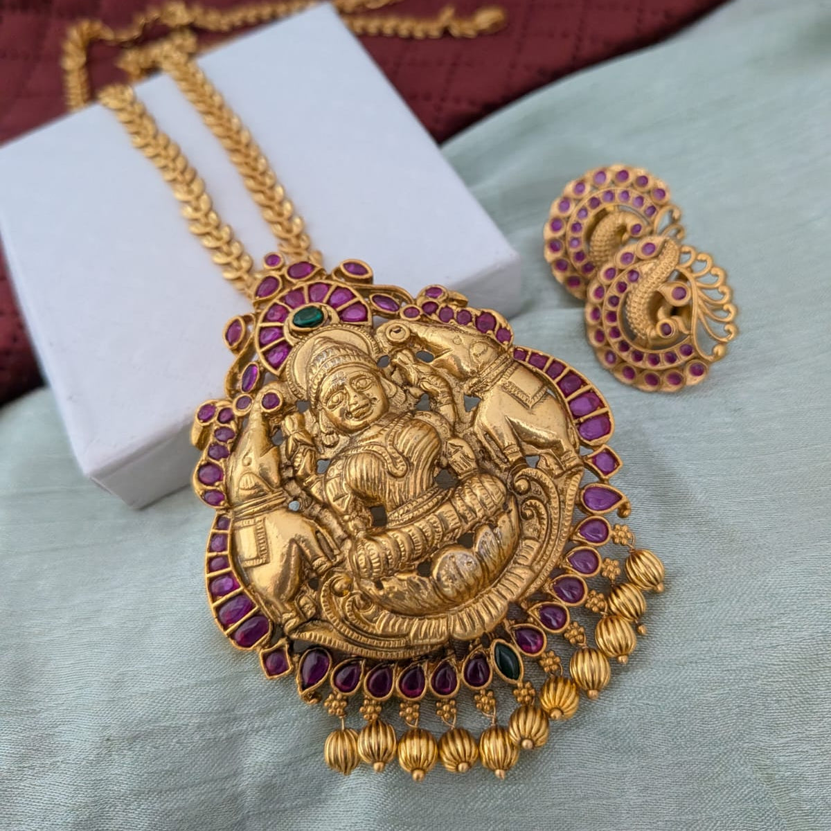 Long gold polished chain with ruby stone lakshmi Pendant necklace