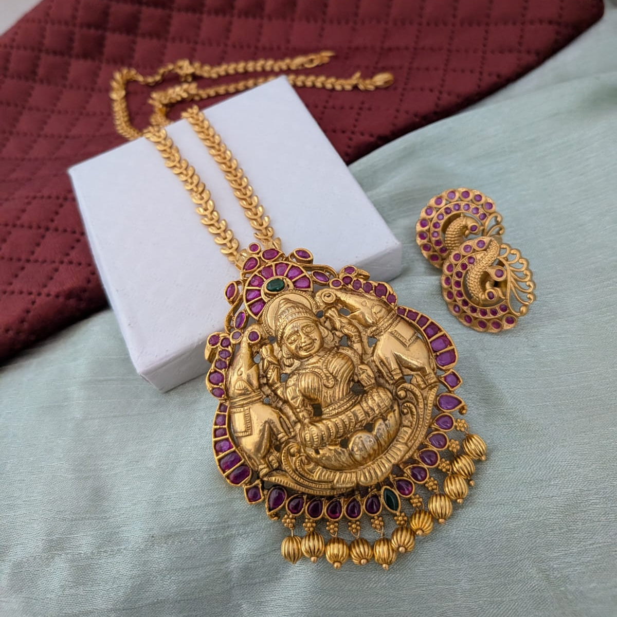 Long gold polished chain with ruby stone lakshmi Pendant necklace