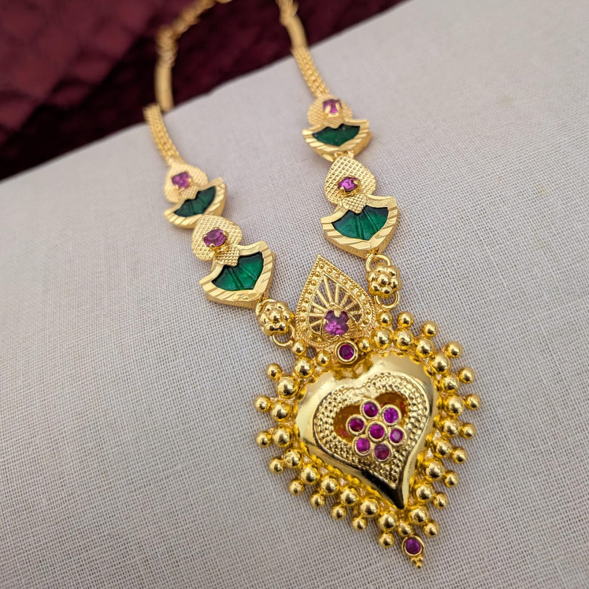 Green palkka with ruby stone necklace
