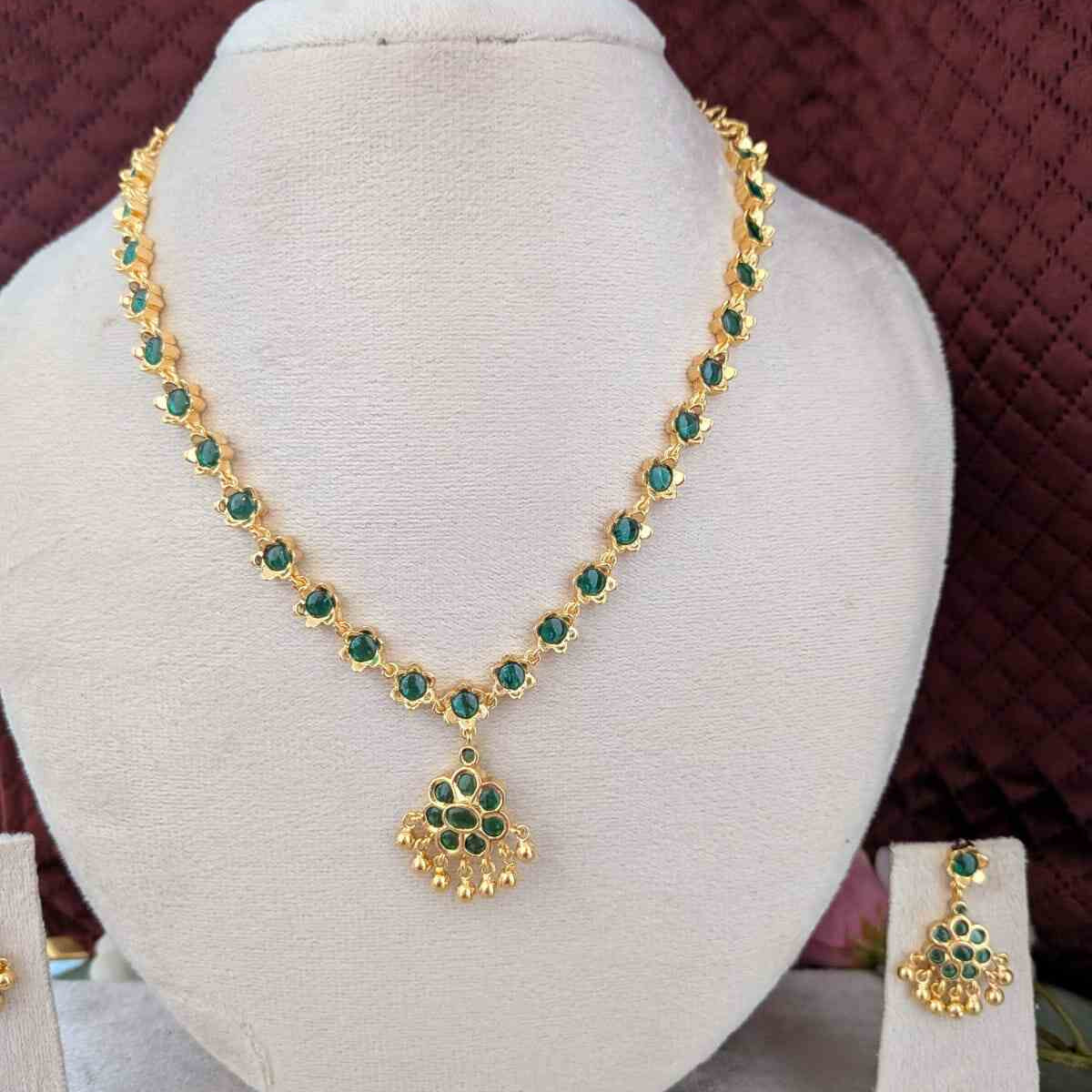 Impon adigai green kemp stone