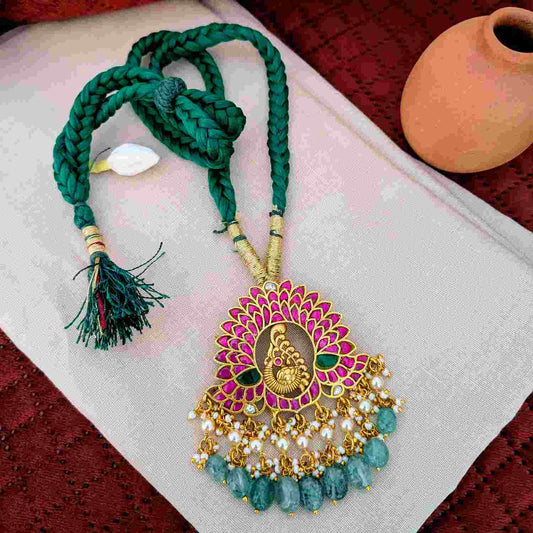 Jadau kundan peacock pendant thread set