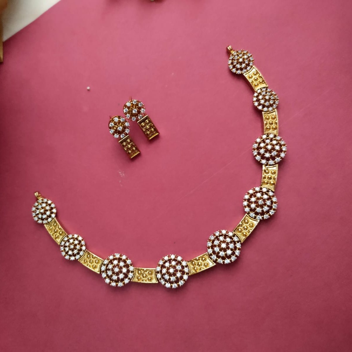 Necklace set, adigai type with round white stone studded pattern around the neck