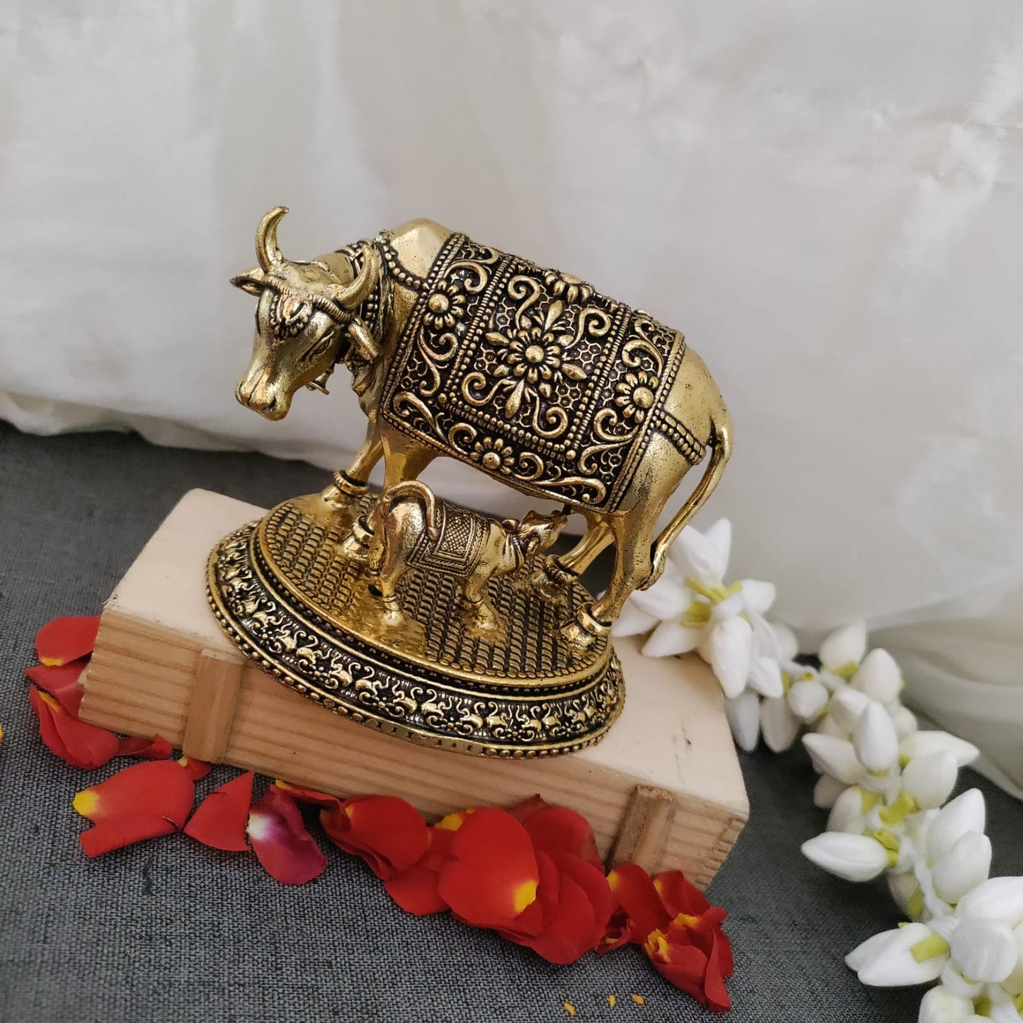 Pure brass kamadhenu cow with calf idol - 8.5 cm