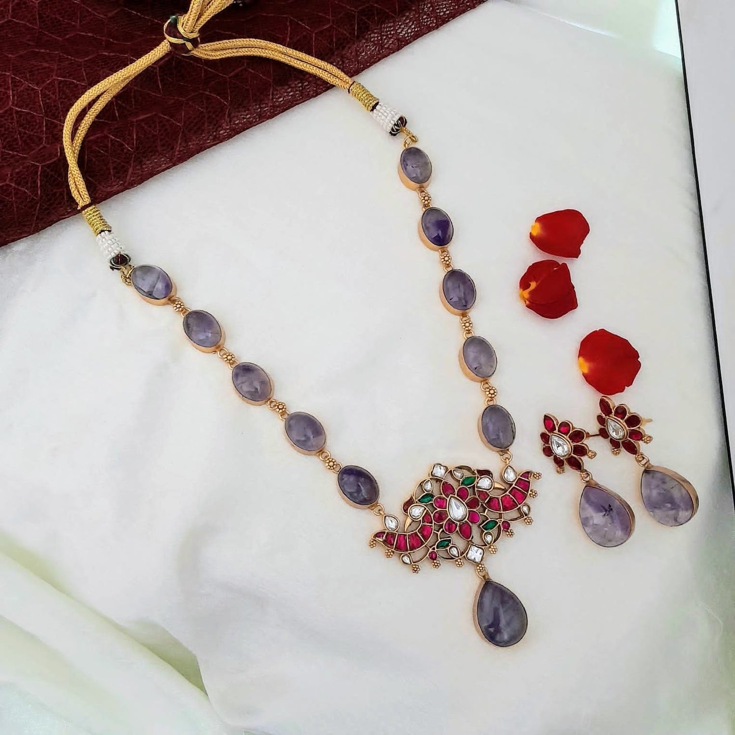 Bold and beautiful Jadau kundan exclusive stone necklace set