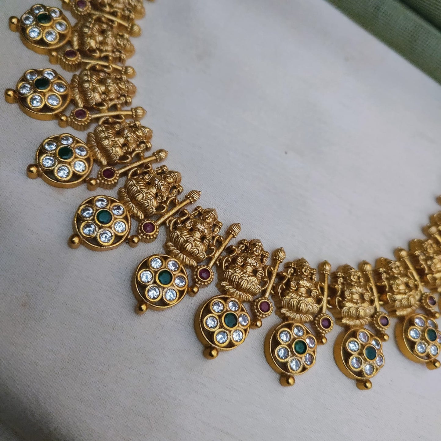 Lakshmi motif with white stone necklace